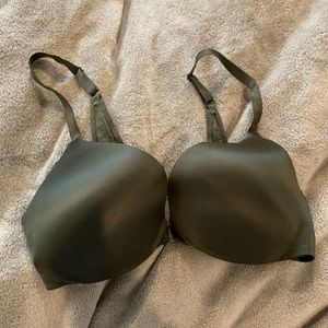 Dark green push up bra with front clasp and adjustable straps. 34D. Like new.